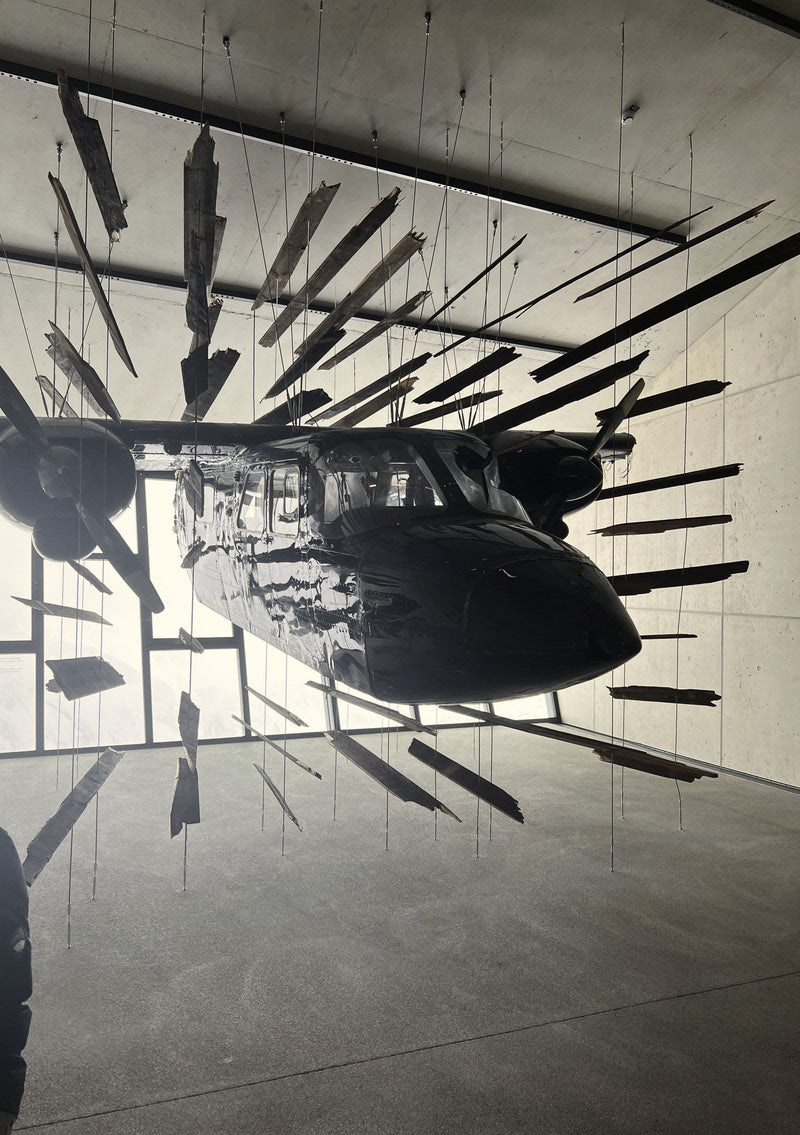 The Spectre plane suspended among shards of wood inside 007 Elements on the Gaislachkogl, Sölden