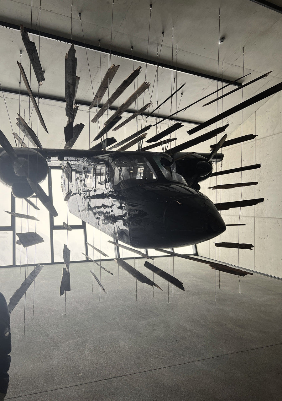 The Spectre plane suspended among shards of wood inside 007 Elements on the Gaislachkogl, Sölden