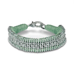 Green Thread Diamond bracelet with diamonds on a white background