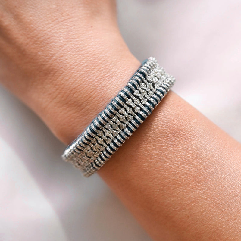 Deep Petrol Teal Stacker bracelet with pavé diamond links worn on the wrist