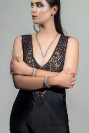 Model wearing The Diamond Ring in Cotton, The LOVE Necklace and teal and claret diamond thread bracelets