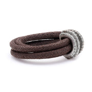 Side view of The Diamond Ring in Cotton: brown braided cotton cord and pavé diamond sterling silver band