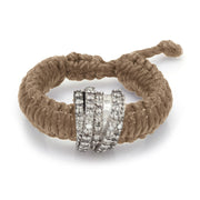 Top view of The Diamond Ring in Saddle Camel Linhasita: pavé diamond sterling silver band on braided waxed thread with adjustable sliding knot