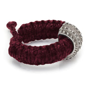 Side view of The Diamond Ring in Vampire Claret Linhasita, showing the adjustable sliding knot on the braided waxed thread