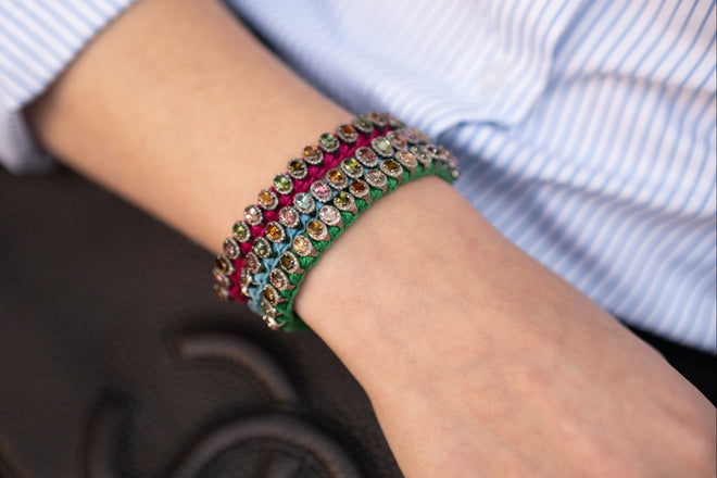 Caravan of Stones diamond and multicoloured tourmaline bracelets stacked on the wrist — collection photograph