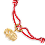 Gold charm with real diamond on a red and pink Kumihimo silk cord 