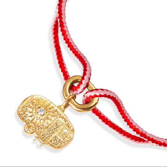 Alassio pink and red kumihimo bracelet with a gold diamond caravan charm