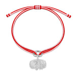 Alassio Diamond Charm Bracelet in vibrant pink and red Kumihimo thread with a silver charm on white