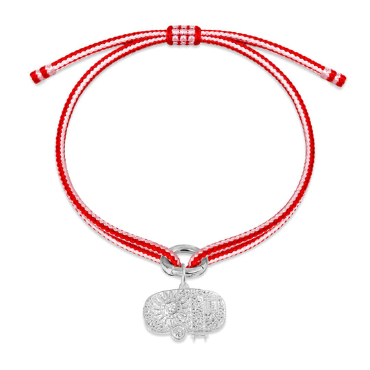 Alassio Diamond Charm Bracelet in vibrant pink and red Kumihimo thread with a silver charm on white