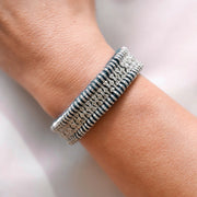 Deep Petrol Teal Stacker bracelet with pavé diamond links worn on the wrist