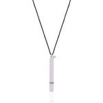 Back of the LOVE Necklace pendant showing the CoS engraving on sterling silver, on a black cord