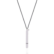 Back of the LOVE Necklace pendant showing the CoS engraving on sterling silver, on a black cord