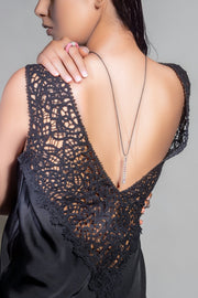 The LOVE Necklace worn down the back over black lace
