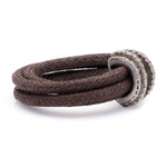 Side view of The Diamond Ring in Cotton: brown braided cotton cord and pavé diamond sterling silver band
