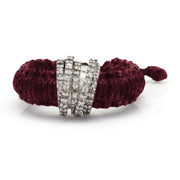 Front view of The Diamond Ring in Linhasita by Caravan of Stones in Vampire Claret: braided waxed thread through a curved sterling silver band pavé-set with natural diamonds