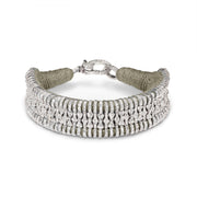 Cashmere Earth taupe thread bracelet with pavé diamonds and silver detailing