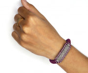Claret Velvet slim stacker diamond bracelet on wrist by Caravan of Stones