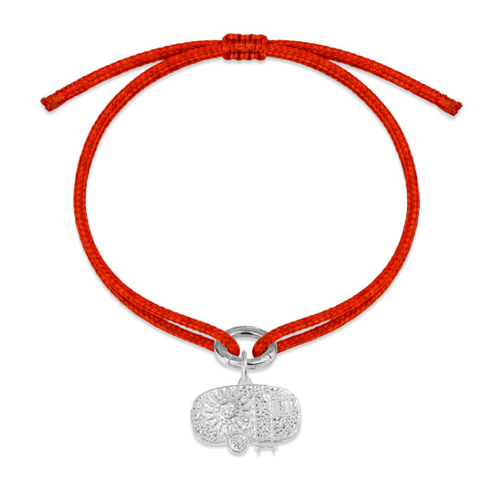 Como Diamond Charm Bracelet in orange Kumihimo thread with a silver diamond charm on white