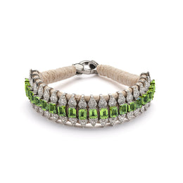 Forte Dei Marmi sand thread bracelet with single-cut diamonds and peridot shown from the front