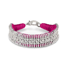 Fuchsia Silver Stacker with pink thread and pavé diamonds on a white background