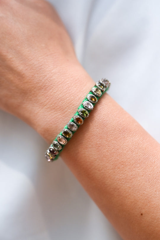 Green Mini Thread diamond bracelet with multi-coloured tourmalines worn on the wrist