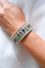 Jaipur sand thread pavé diamond and multi-coloured tourmaline bracelet worn on the wrist