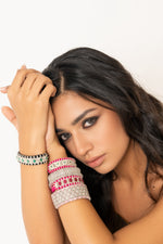 London black thread emerald and diamond bracelet by Caravan of Stones
