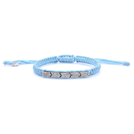 Méridien baby blue bracelet laid flat on a white background
