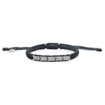 Méridien black bracelet with a pavé diamond panel on a white background