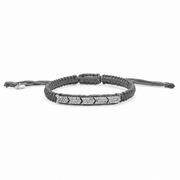 Dark olive gunmetal braided bracelet with pavé diamonds on a white background