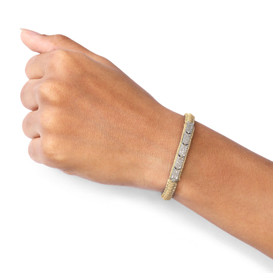 Méridien Saddle Camel bracelet worn on a wrist against a white background