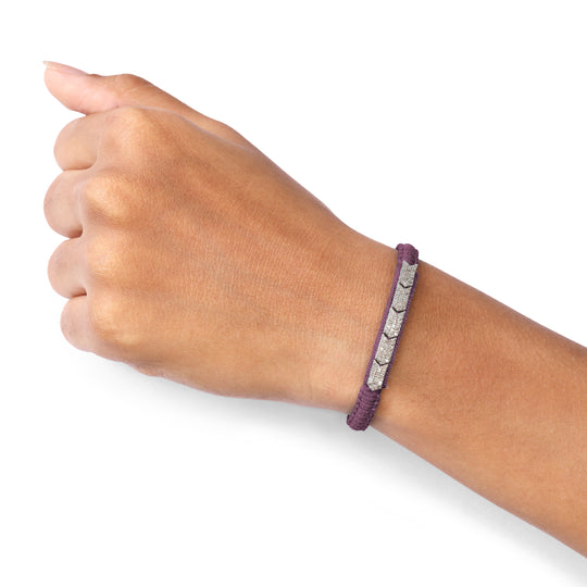 Méridien Vampire Claret bracelet worn on a wrist against a white background