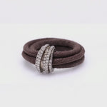360° video of The Diamond Ring in Cotton, brown braided cotton cord with a pavé diamond sterling silver band