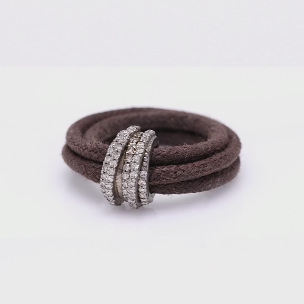 360° video of The Diamond Ring in Cotton, brown braided cotton cord with a pavé diamond sterling silver band