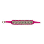 Salar pink thread pavé diamond and emerald bracelet laid flat