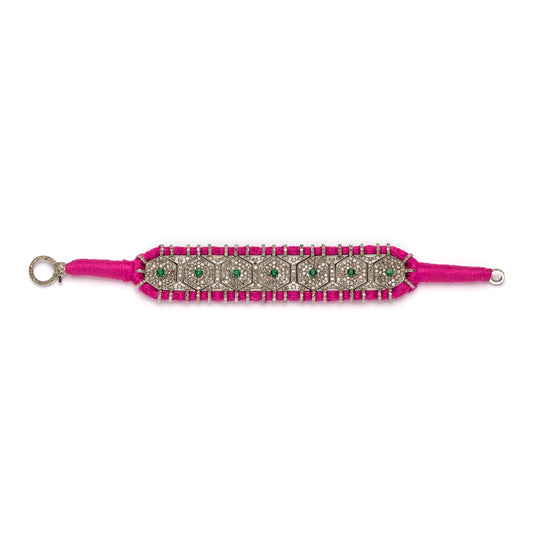 Salar pink thread pavé diamond and emerald bracelet laid flat