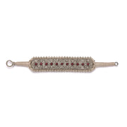 Side view of the Skoura sand thread diamond and ruby bracelet