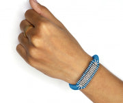 Sky blue slim stacker diamond bracelet on wrist by Caravan of Stones