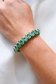 Venice Green Pavé Diamond and Emerald Bracelet worn on a wrist